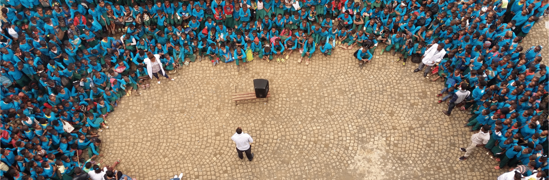 Speaker talking to large crowd